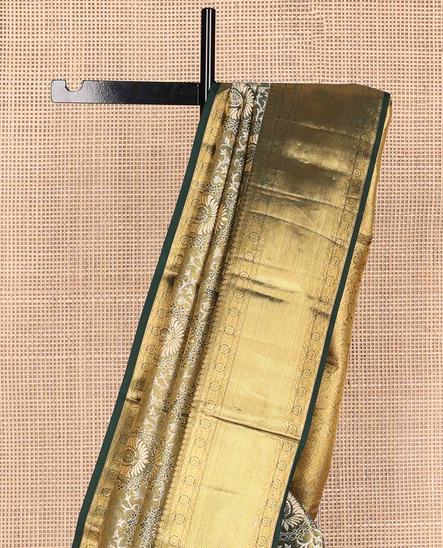 Green jacquard tissue silk saree, intricately designed pallu & zari border of manga mokku,neli kathir,kamalam & zari stripes
