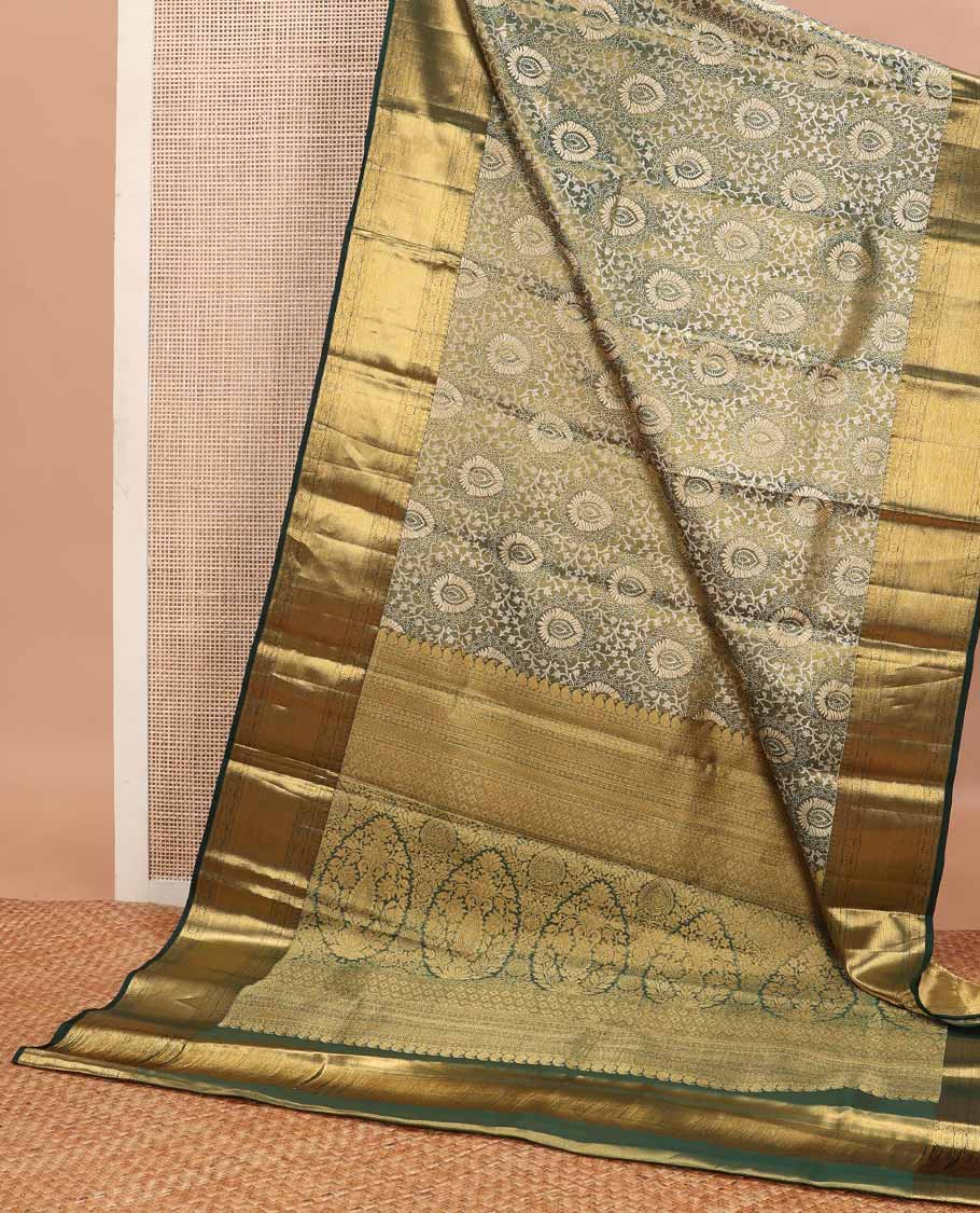 Green jacquard tissue silk saree, intricately designed pallu & zari border of manga mokku,neli kathir,kamalam & zari stripes