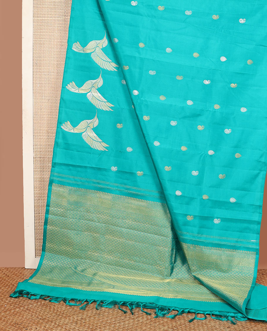 Borderless blue zari buttas Kanchipuram silk saree, self-pallu of thilakam mokku, muthu, kathir & jaal designs