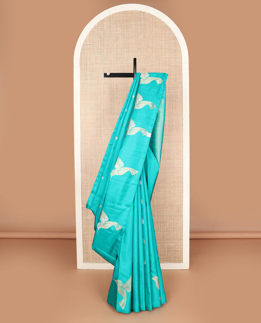Borderless blue zari buttas Kanchipuram silk saree, self-pallu of thilakam mokku, muthu, kathir & jaal designs