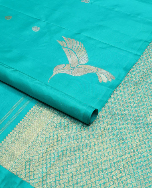Borderless blue zari buttas Kanchipuram silk saree, self-pallu of thilakam mokku, muthu, kathir & jaal designs