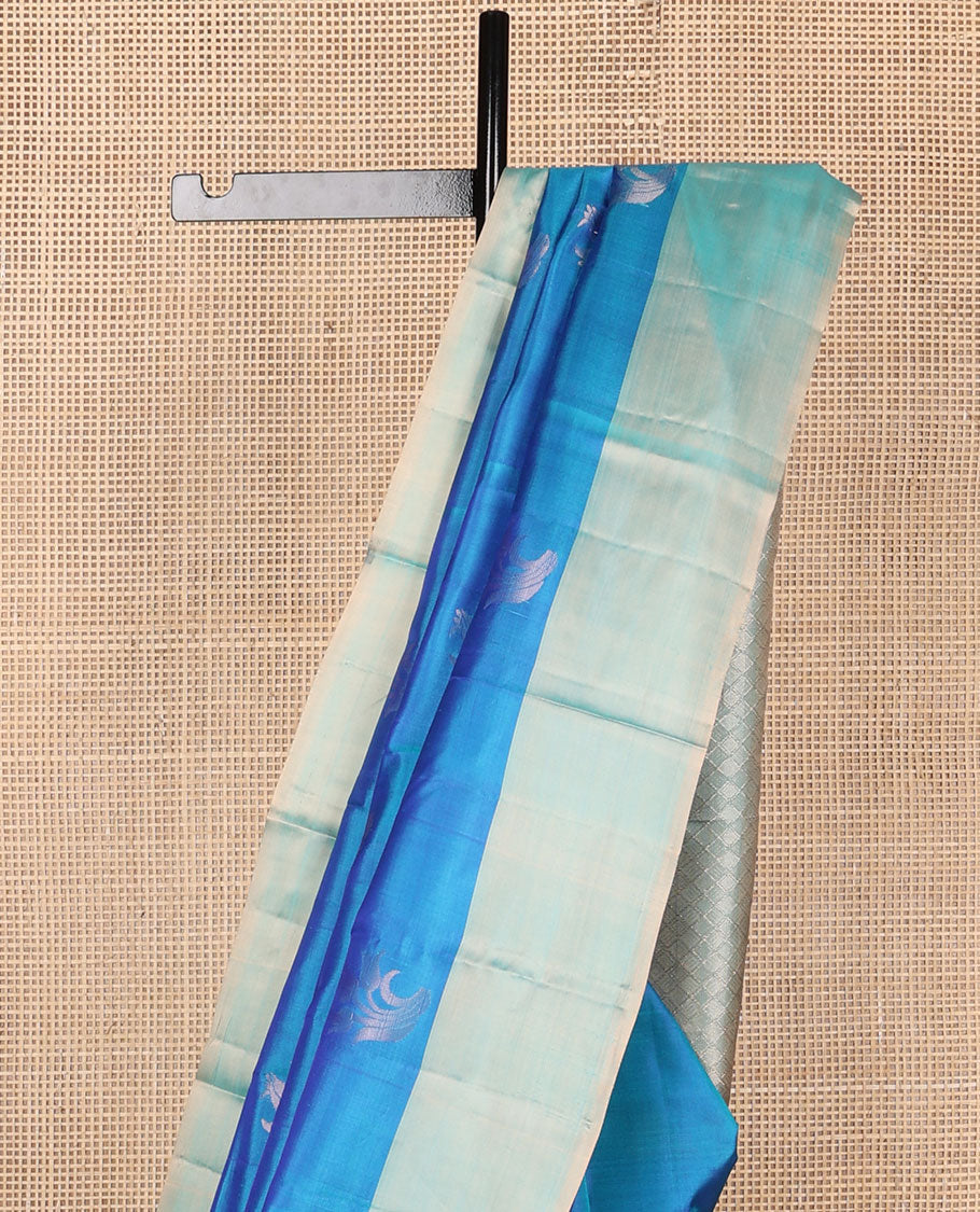 Blue floral zari buttas Kanchipuram silk saree, contrast plain border & pallu of jaal & kodi visiry designs