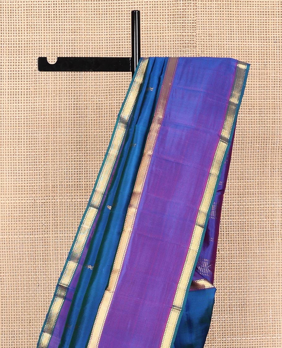 Blue zari buttas Kanchipuram silk saree, contrast rettai pettu zari border of muthu designs, and zari design pallu