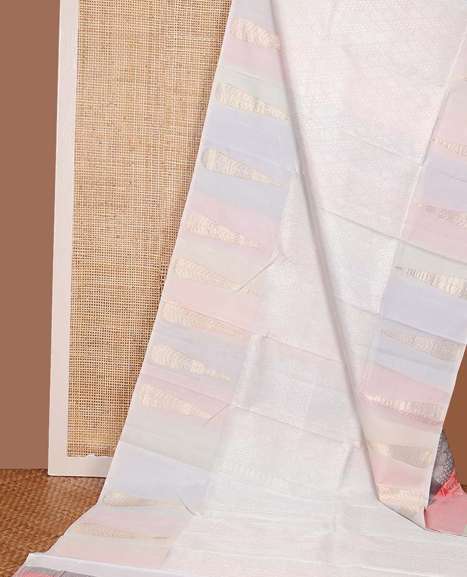 Cream and multi-color half-and-half ogee patterned Kanchipuram silk saree, zari border of big thilakam-shaped leaf buttas, and jaal pallu