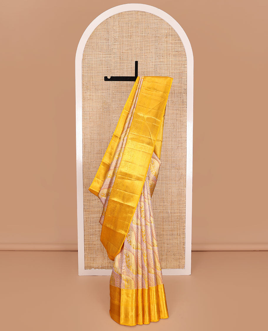 Pink Kanchipuram Tissue Silk Saree, Mesmerized with Jacquard Design on Its Body, Complemented by a Contrast Border of Thilakam, Kodi Visiry, Muthu, Mayil Kann, and Kathir Designs, Pallu Steeped with Poun Designs, and Paired with a Contrast Blouse