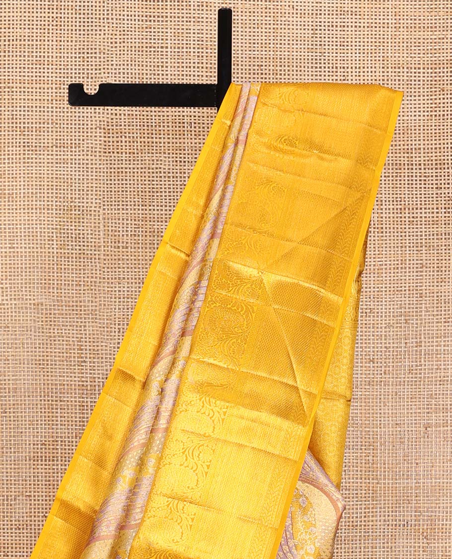 Pink Kanchipuram Tissue Silk Saree, Mesmerized with Jacquard Design on Its Body, Complemented by a Contrast Border of Thilakam, Kodi Visiry, Muthu, Mayil Kann, and Kathir Designs, Pallu Steeped with Poun Designs, and Paired with a Contrast Blouse