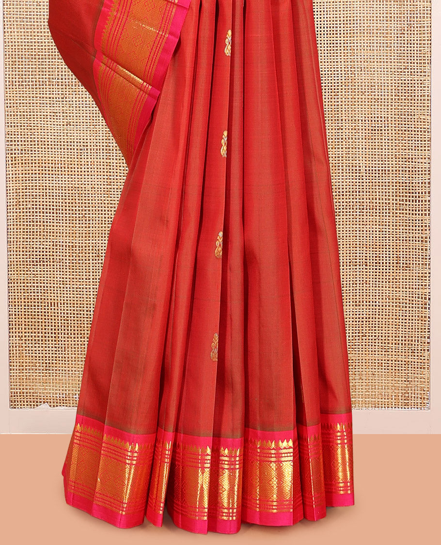 Rust Kanchipuram Silk Saree, Accentuated with Zari Buttas, Complemented by a Contrast Border of Thilakam Mokku, Banaras, Muthu, and Jaal Design, Pallu of Zari Design, and No Blouse