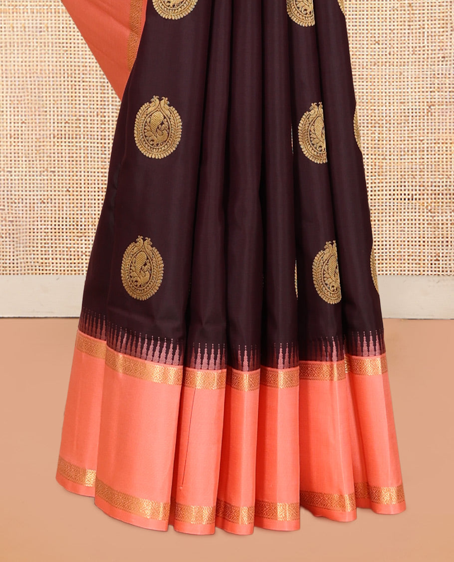 Coffee Brown Vasundhara Silk Saree Accentuated with Round Mayil Buttas, Complemented with Contrast Rettai Pettu Thazampoo Rekku Zari Border, Beautifully Woven Pallu of Jaal Design, and Paired with a Contrast Blouse