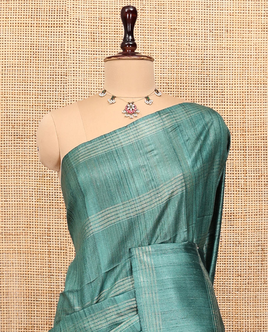Borderless Green Tussar Silk Saree, Detailed with Stripes, a Striped Pallu, and a Matching Blouse