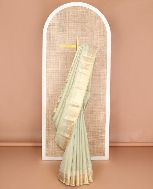 Off-white muniya buttas Vasundhara silk mix saree, seppu rekku zari border & pallu or seppu rekku design