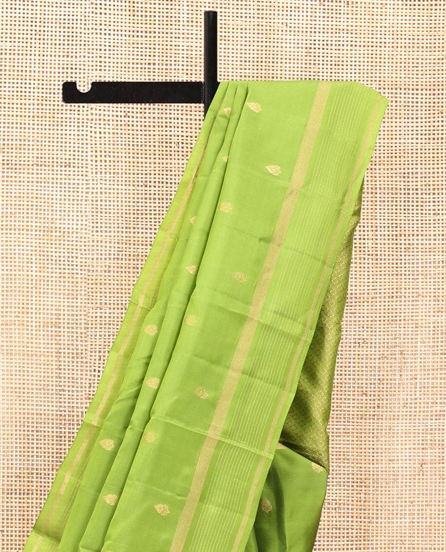 Green Vasundhara Lite Silk Mix Saree, Subtly Sparkled with Zari Buttas All Over Its Body, Highlighted by a Zari Striped Border, Jaal-Patterned Pallu, and Paired with a Matching Blouse