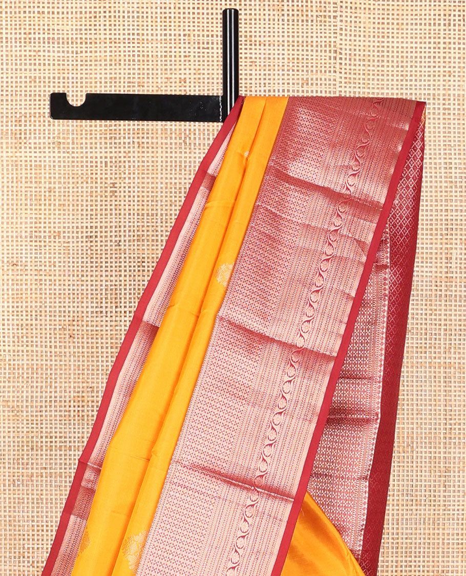 Orange buttas silk saree with contrast border of thilakam mokku, muthu, banaras design & jaal pallu