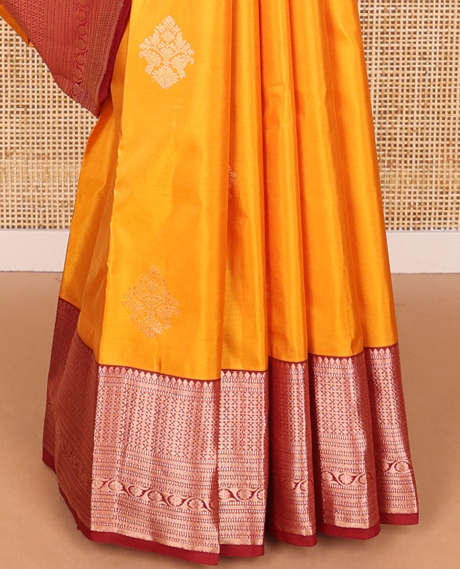Orange buttas silk saree with contrast border of thilakam mokku, muthu, banaras design & jaal pallu