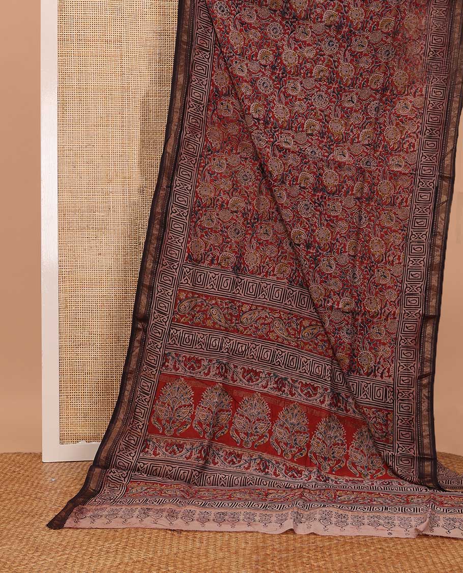 Red floral machine printed kalamkari cotton saree, contrast traditional zari border, and pallu of floral print