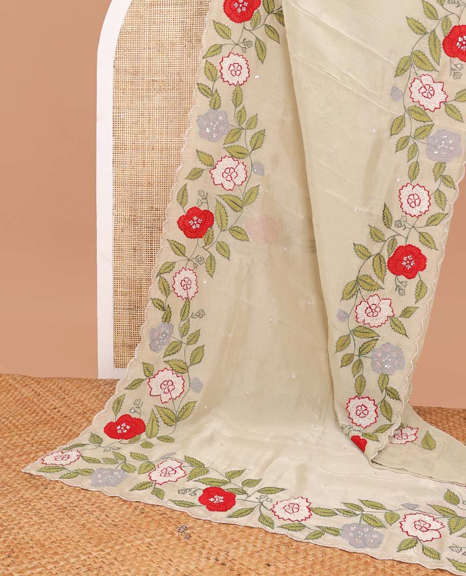 Cream all-over sequins embroidery tissue saree with floral , sequins embroidery scallop border