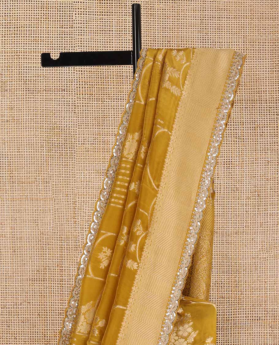 Mustard floral design with striped zari border & intricate zari design pallu