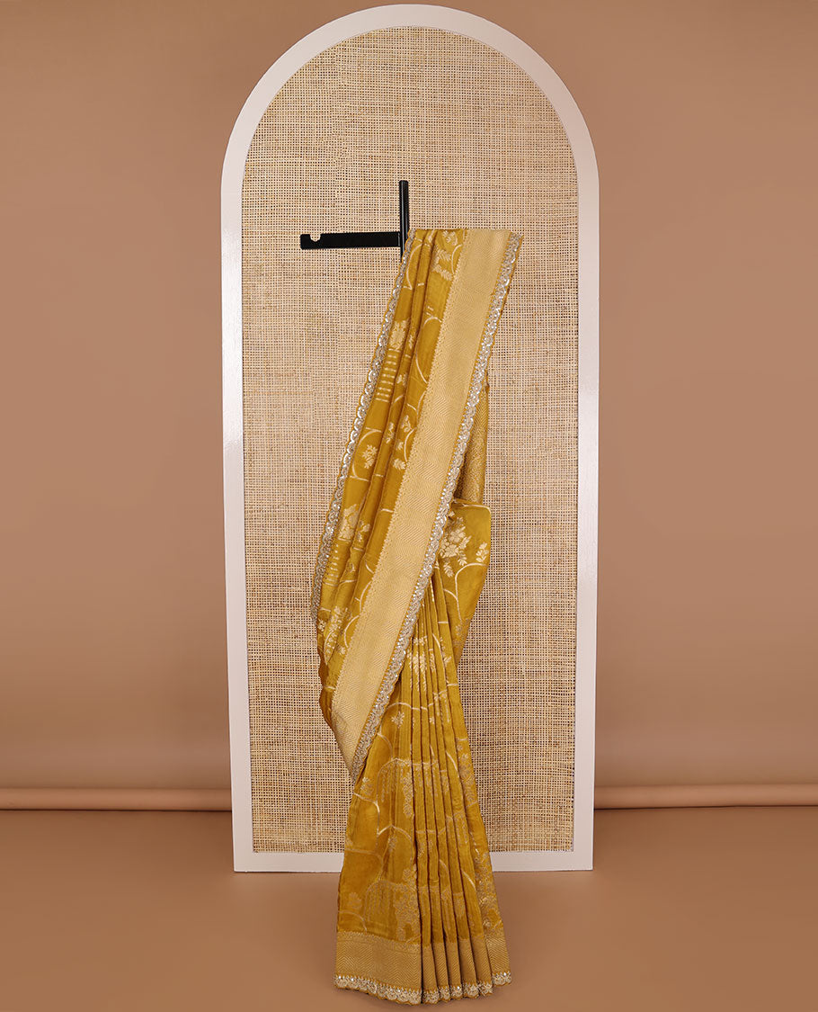 Mustard floral design with striped zari border & intricate zari design pallu