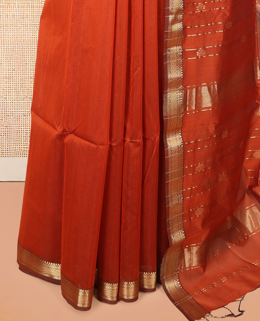 Rust Maheshwari Cotton Saree Featuring Zari Buttas, a Contrast Traditional Zari Border, Zari Striped Pallu, and a Matching Blouse