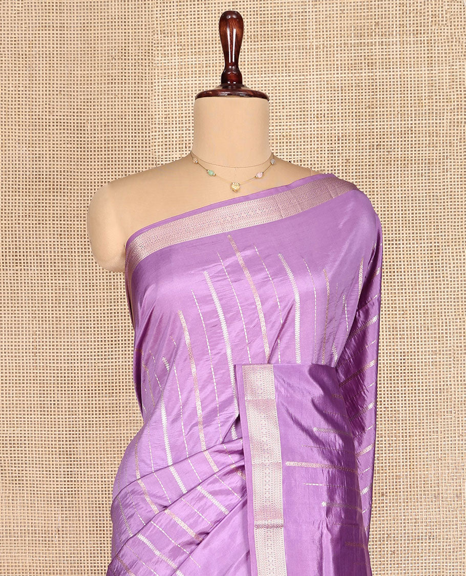 Lavender Dupion Silk Saree, Ornamented with Zari Stripes, Highlighted by a Traditional Zari Design Border, Contrast Pallu of Geometric Design, and a Contrast Blouse