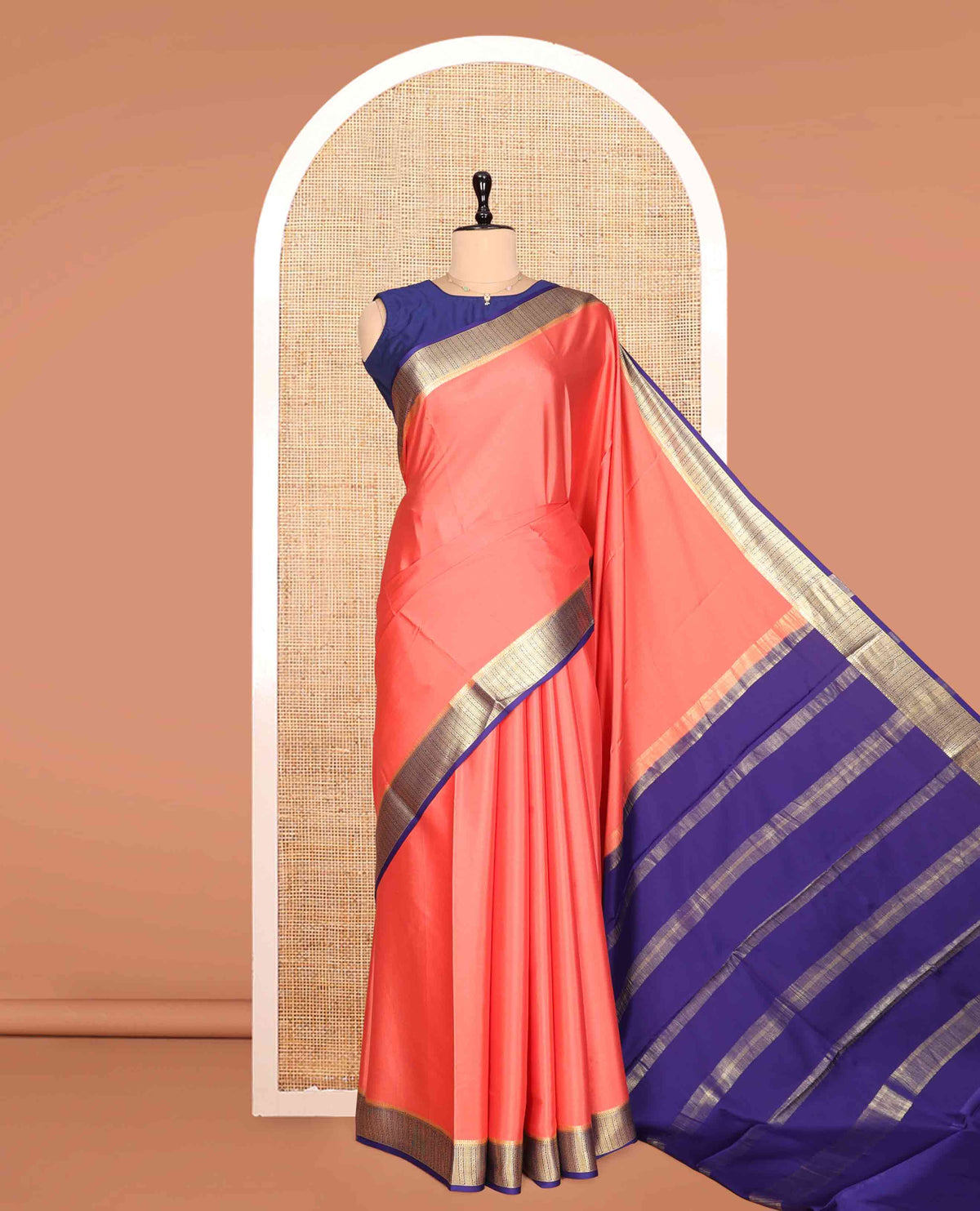 Peach Plain Mysore Silk Saree, a Contrast Traditional Zari Border, Zari Striped Pallu, and a Contrast Blouse