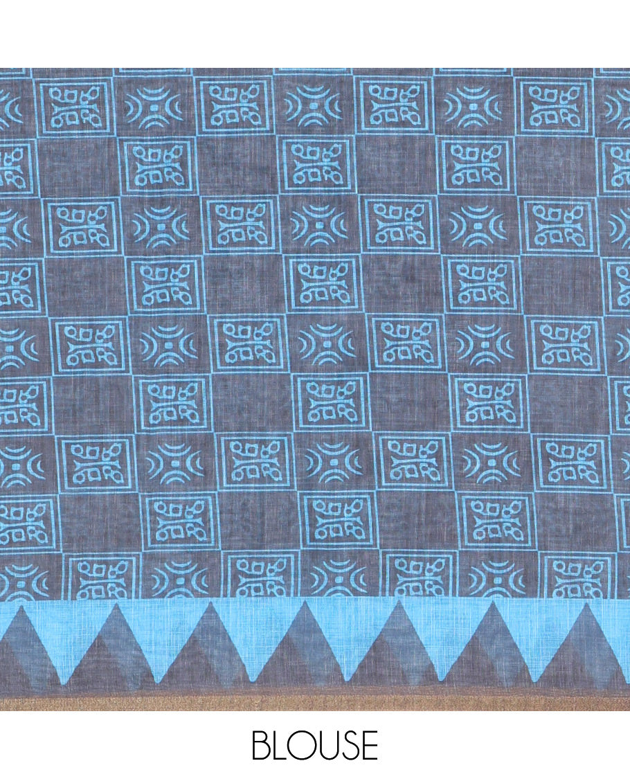 Blue vertical stripes printed linen cotton saree, a temple-printed border, big polka dot printed pallu, and a printed blouse