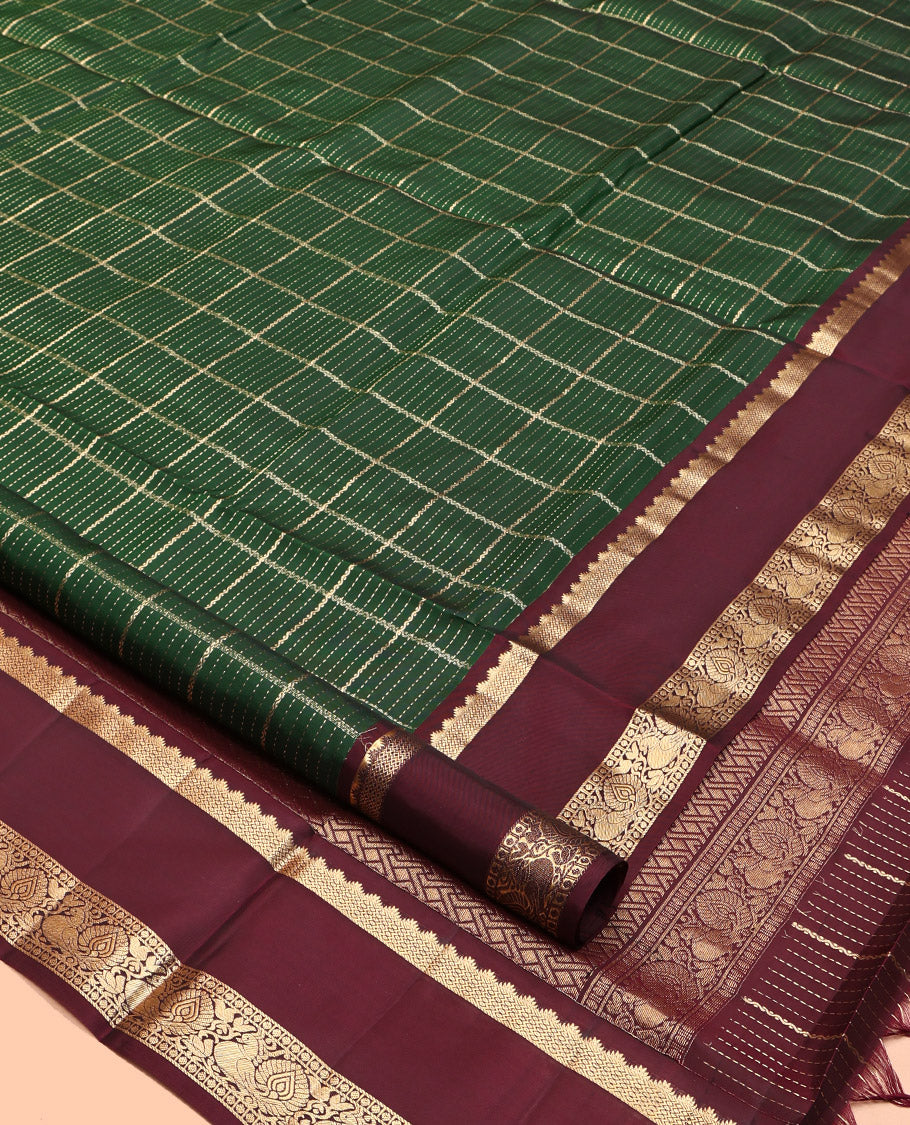 Green Mayuri Lite Silk Mix Saree, Spotlighted with Zari Checks, a Contrast Rettai Pettu Border of Rekku, Rudraksha, and Mayil, Geometric Pallu, and a Contrast Blouse