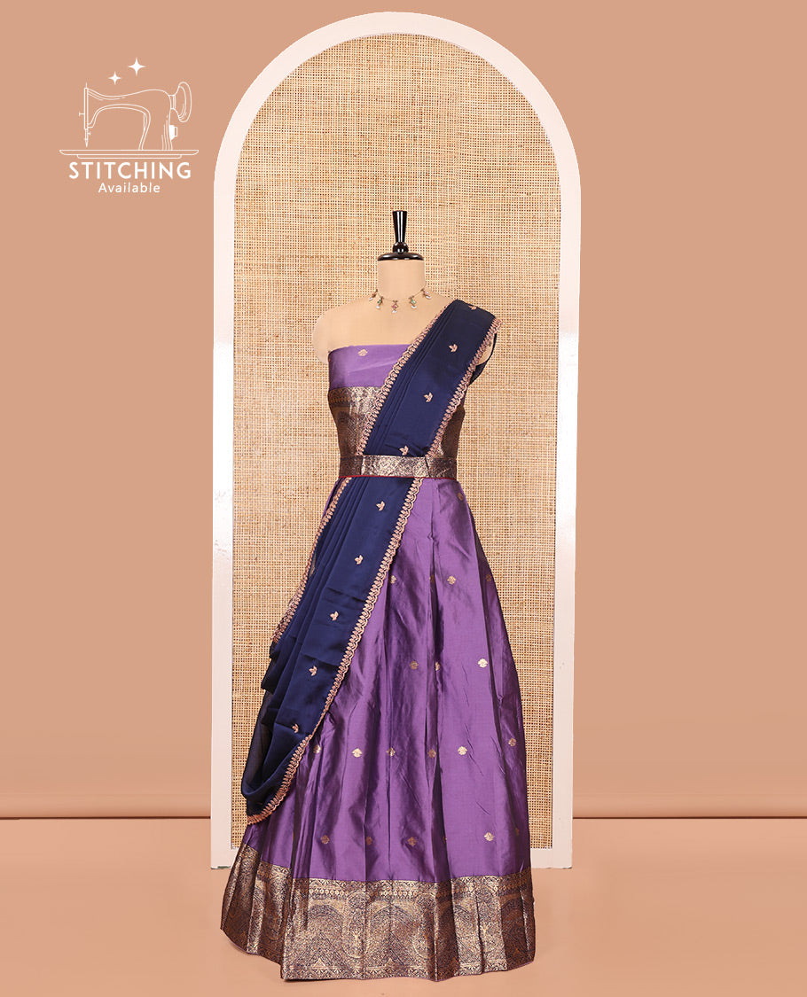 Violet and Blue Semi-Banarasi Half-Saree, Delicately Detailed with Zari Buttas on Its Skirt, Complemented by a Contrast Geometric Patterns Zari Woven Border, Paired with a Matching Blouse, and a Contrast Satin Georgette Embroidered Scallop Dhavani