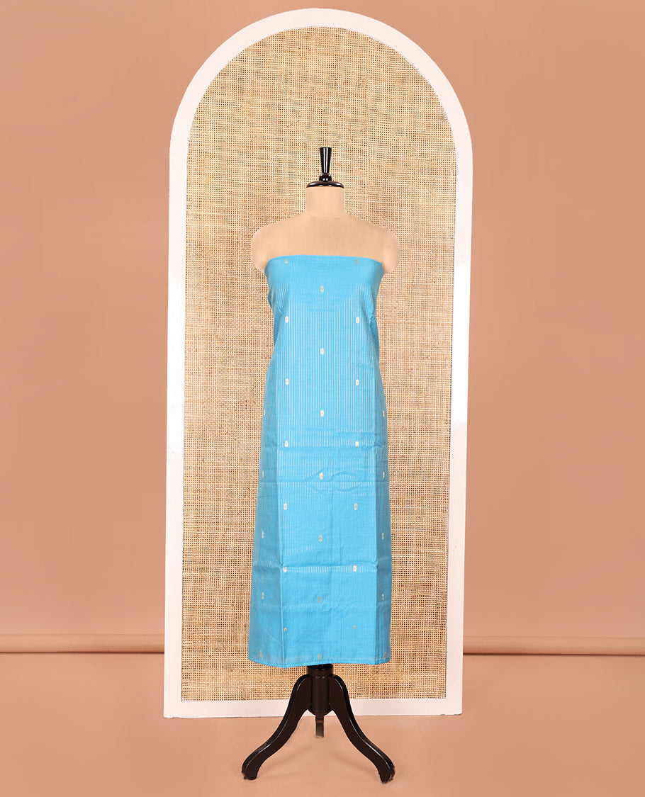 Blue Material Chudidhar Set, Delicately Woven with Dotted Stripes and Buttas on Its Semi-Silk Top, Plain Cotton Bottom, and Semi-Silk Dupatta Illustrating Pichwai Cow and Floral Print