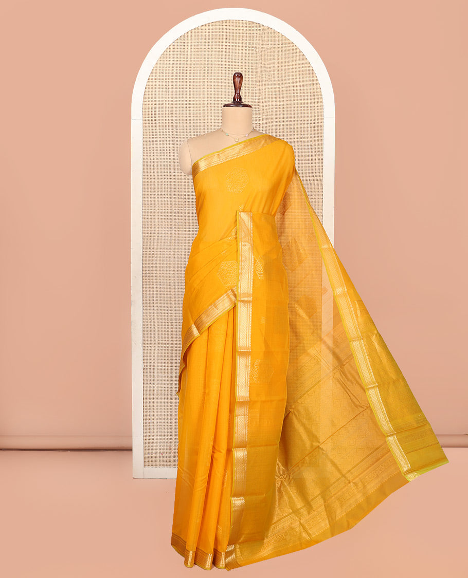 Yellow Silk Cotton Saree, Sparsely Woven with Geometric Buttas All Over Its Body, Highlighted by Traditional Zari Designs Woven Border, Grand Jaal Pallu and Paired with a Matching Blouse