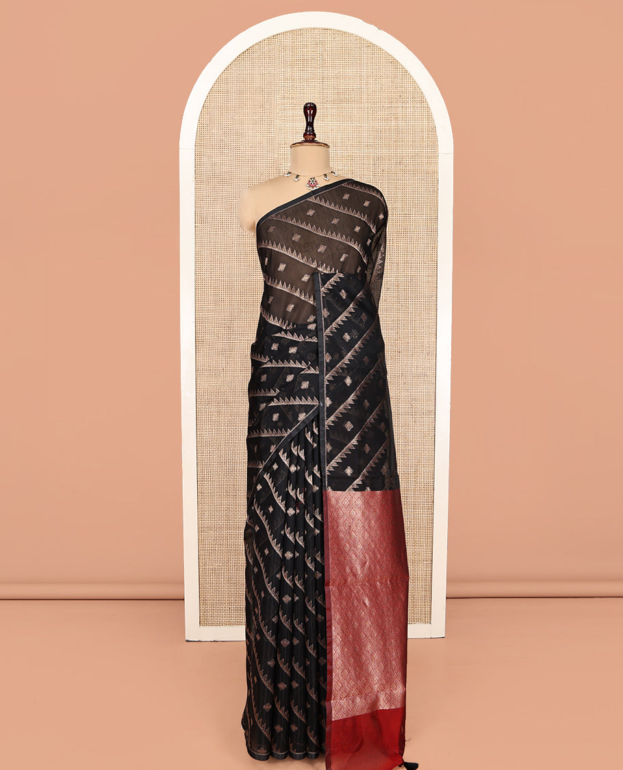 Borderless Black Chanderi Cotton Saree, Adorned with Zari Buttas and Temple Stripes on Its Body, Complemented by Contrast Pallu of Jaal Designs, and Paired with a Contrast Jacquard Blouse