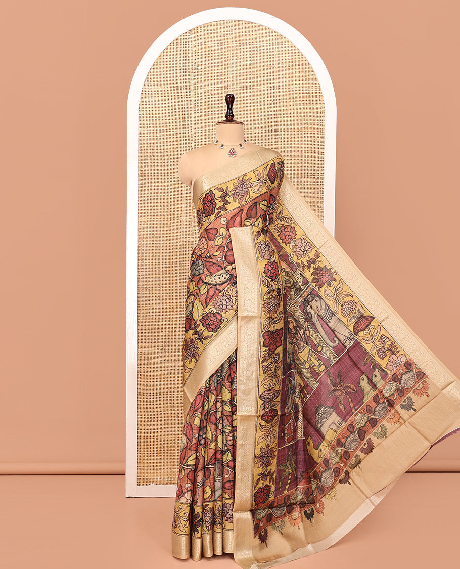 Brown Kalamkari Saree, Embellished with Floral Print, Complemented by Contrast Zari Border, Pallu of Human Figurines Print, and a Contrast Blouse