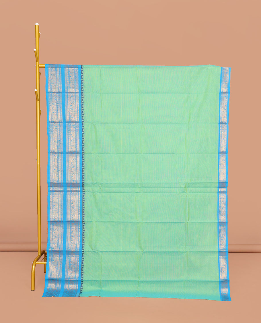 Bright Sea Green Plain Chettinad Cotton Saree, Complemented by a Contrast Traditional Zari Design Border, Pallu of Stripes, and Paired with a Matching Blouse