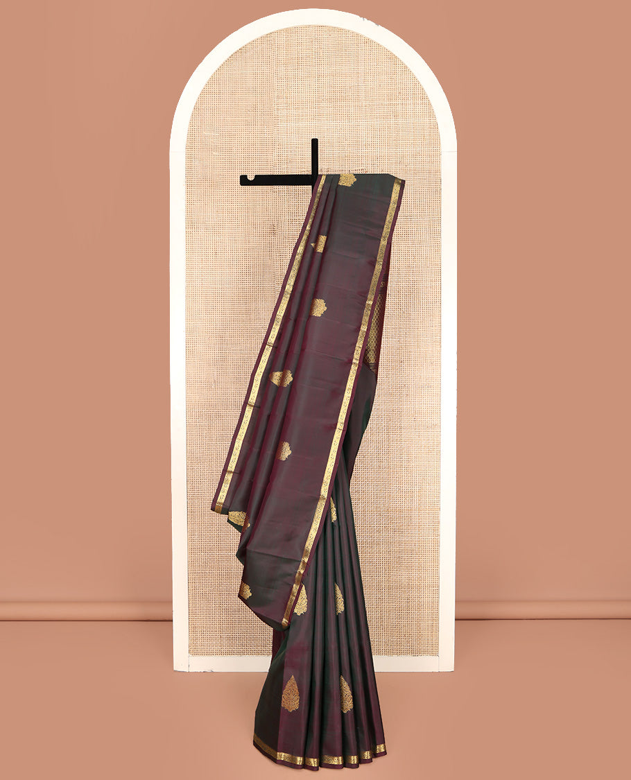 Brown Kanchipuram Silk Saree, Elevated with Zari Buttas All Over Its Body, Highlighted by Zari Piping Border, Grand Scallop Design Pallu, and Paired with a Matching Blouse
