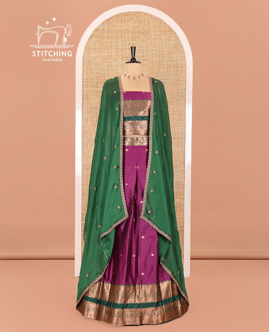Purple and Green Semi-Banarasi Half-Saree Featuring Zari Buttas Skirt, Complemented by Contrast Rettai Pettu, Traditional Border of Floral Creeper Designs, Paired with a Matching Blouse, and a Satin Georgette Embroidered Scallop Dhavani