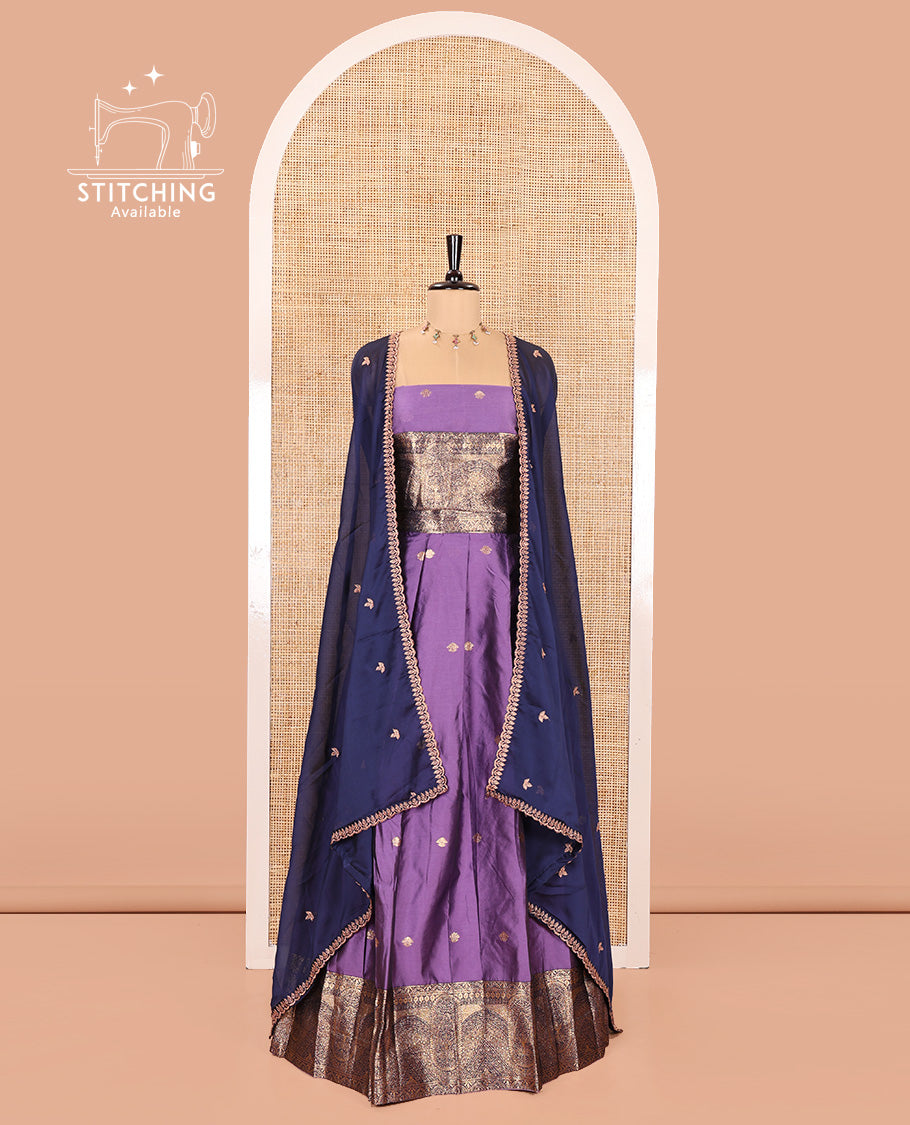 Violet and Blue Semi-Banarasi Half-Saree, Delicately Detailed with Zari Buttas on Its Skirt, Complemented by a Contrast Geometric Patterns Zari Woven Border, Paired with a Matching Blouse, and a Contrast Satin Georgette Embroidered Scallop Dhavani