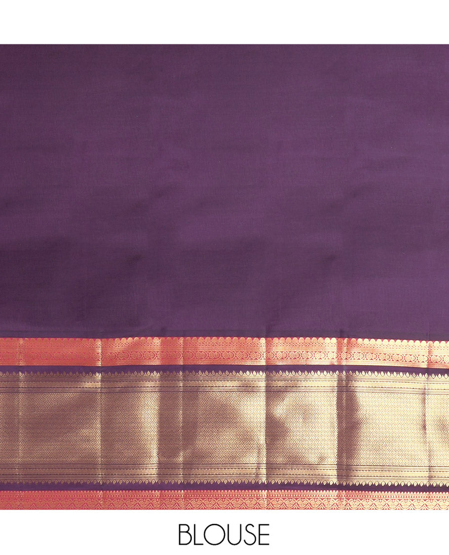 Lavender Vasundhara Lite Silk Mix Saree, Spotlighted with Zari Buttas on Its Body, Complemented by a Contrast Border of Thilakam Mokku, Mayil, and Yaali Designs, a Grandly Zari Decked Up Pallu, and Paired with a Contrast Blouse