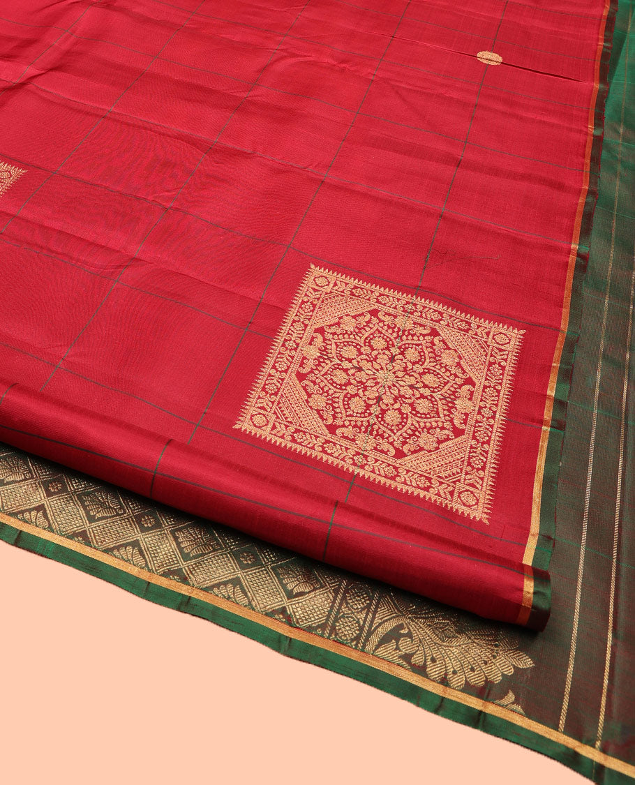 Borderless Red Kanchipuram Silk Saree, Accentuated with Big Decorated Square Buttas Enclosed Checks on its Body, Complemented by a Contrast Pallu of Jaal Designs, and Paired with a Contrast Blouse