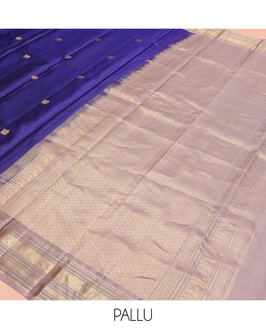 Blue Vasundhara Silk Saree, Ornamented With Vaira Oosi Stripes, Mayil and Chakram Buttas, Complemented by Contrast Border of Rekku, Mayil, Mayil Kann, and Ara Maadam Designs, Grand Pallu and Paired with a Contrast Blouse