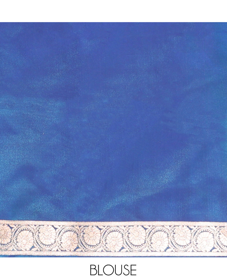 Blue Banarasi Nylon Saree, Bedecked with Floral Buttas, Highlighted by a Traditional Zari Border, Intricate Pallu, and a Matching Blouse