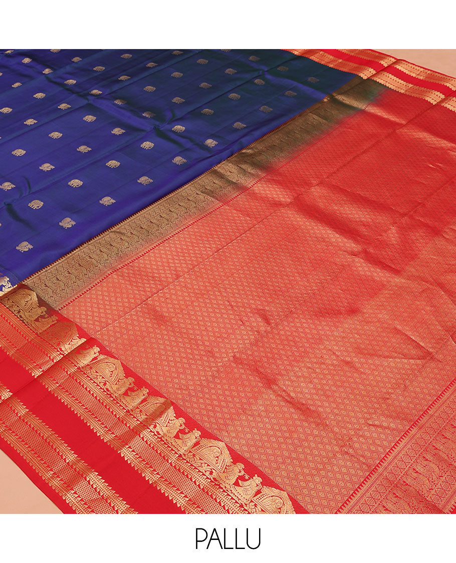 Blue Vasundhara Silk Saree, Dazzled with Mayil and Yaanai Buttas All Over Its Body, Complemented by Contrast Border of Wedding-Theme Motifs, Ara Bogudi, Muthu, and Ara Maadam Designs, Grand Jaal Pallu, and Paired with a Contrast Blouse