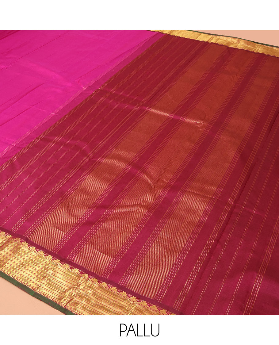 Rani Pink Plain Kanchipuram Silk Saree, Complemented by a Contrast Border Featuring Thazampoo Rekku, Muthu, and Vanki Designs, Scintillating Pallu of Zari Weave, and Paired with a Contrast Blouse