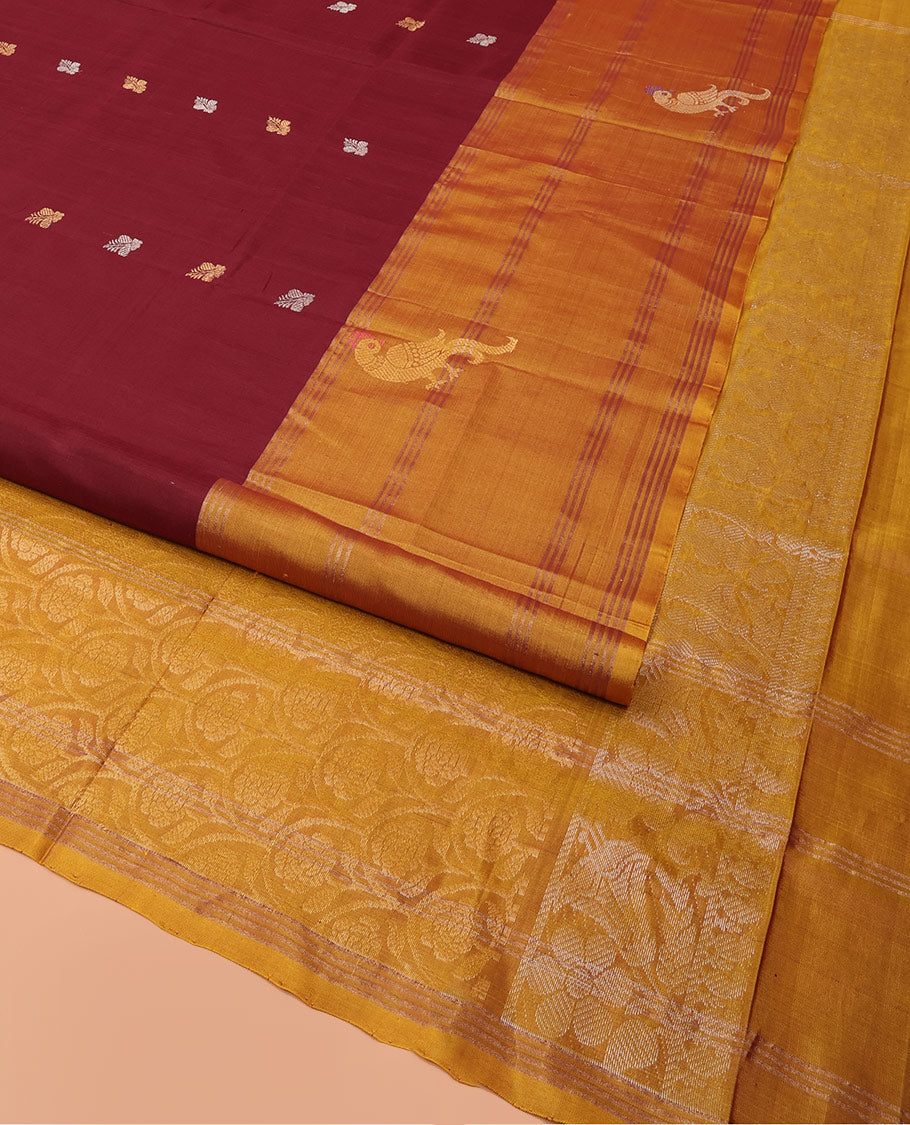 Maroon Uppada Silk Saree Ornamented with Zari Buttas, Complemented by a Contrast Zari Border of Bird Designs, Contrast Pallu of Scallop Designs, and Paired with a Contrast Blouse
