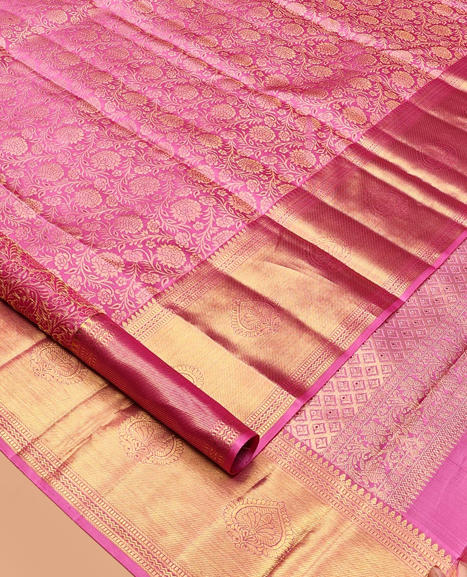 Pink Kanchipuram Wedding Silk Saree, Spotlighted with Jacquard Design, a Traditional Zari Border, a Grand Jaal Pallu, and a Matching Blouse
