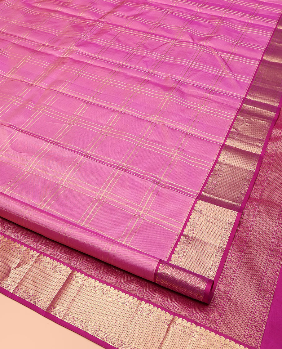 Pink Kanchipuram Silk Saree, Gleamed Up with Zari Checked Design on Its Body, Complemented by a Contrast Border of Manga, Rekku, Cross Kamalam, and Mayil Kann Designs, Grand Jaal Pallu, and Paired with a Contrast Blouse