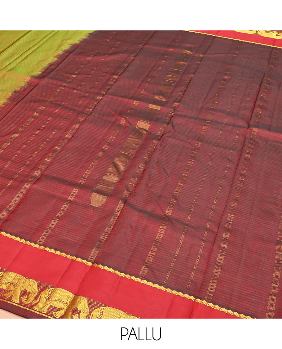 Green Dual-Toned Vazhaipoo Striped Kanchipuram Silk Saree, Complemented by Contrast Rettai Pettu Border of Thilakam Mokku, and Yaanai Designs, Pallu Subtly Woven in Stripes, and Paired with a Contrast Blouse