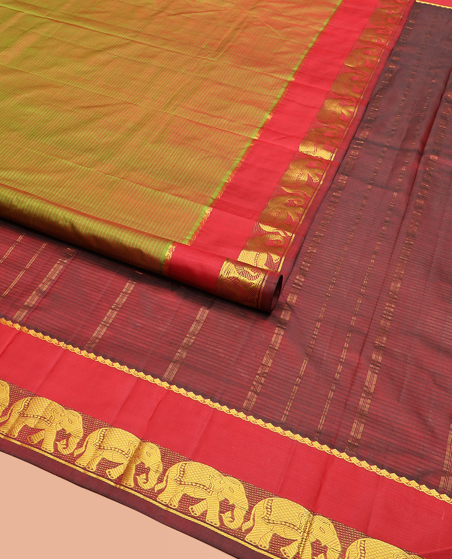 Green Dual-Toned Vazhaipoo Striped Kanchipuram Silk Saree, Complemented by Contrast Rettai Pettu Border of Thilakam Mokku, and Yaanai Designs, Pallu Subtly Woven in Stripes, and Paired with a Contrast Blouse