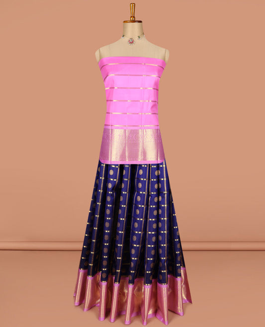 Blue pure silk half saree, chakram enclosed checked skirt, contrast zari design blouse, border of rudraksham, manga and mayil kann designs, and intricate dhavani
