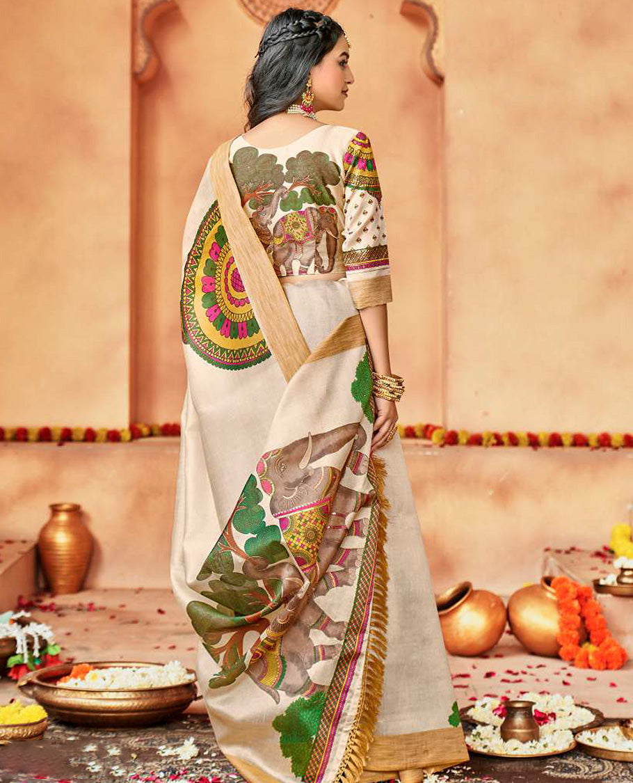 Cream designer catalog saree features Onam pookalam and elephant motifs, bavanji border, and elephant motif pallu