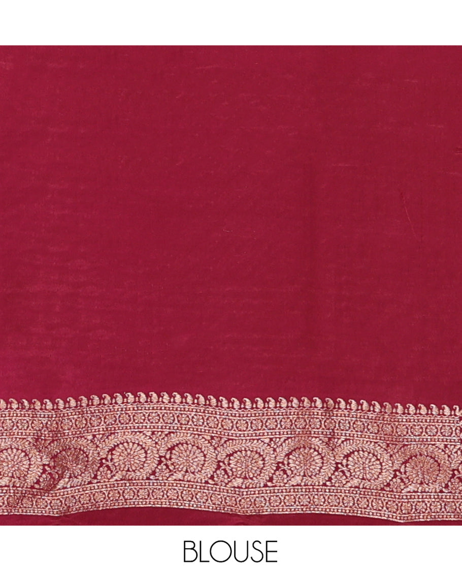 Light Maroon Fancy Crepe Saree, Steeped with Buttas, Highlighted by a Floral Creeper Border, Intricately Designed Pallu, and a Matching Blouse