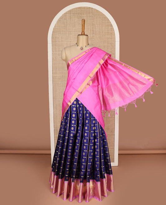 Blue pure silk half saree, chakram enclosed checked skirt, contrast zari design blouse, border of rudraksham, manga and mayil kann designs, and intricate dhavani